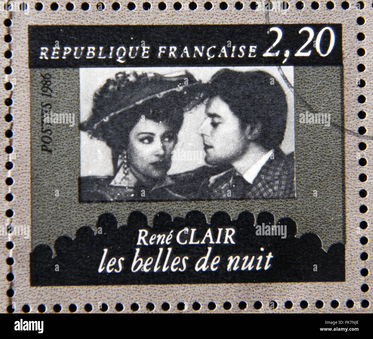 FRANCE - CIRCA 1986: stamp dedicated to centenary of the French cinema shows Rene Clair 'Beautiful Night', circa 1986 Stock Photo