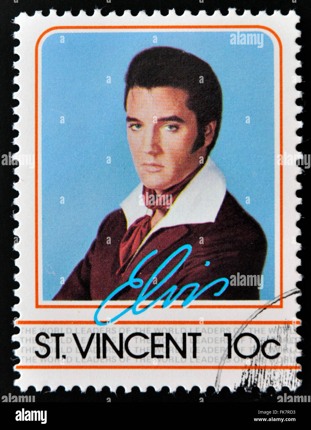ST. VINCENT - CIRCA 1985: A stamp printed in St. Vincent, shows Elvis Presley, circa 1985. Stock Photo
