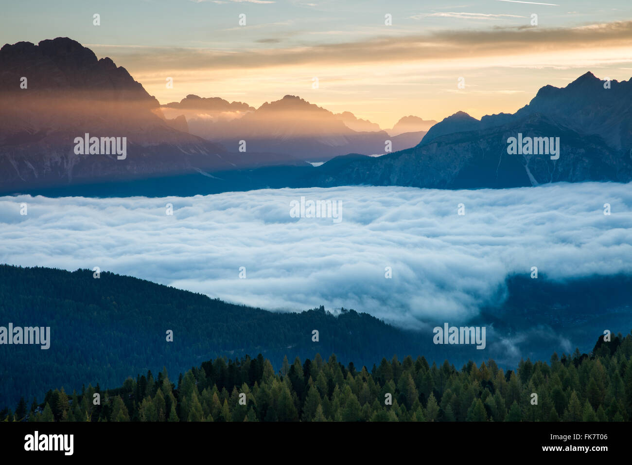 dawn over Monte Cristallo & Cortina d'Ampezzo from Cinque Torri, Dolomite Mountains,  Belluno Province, Veneto, Italy Stock Photo