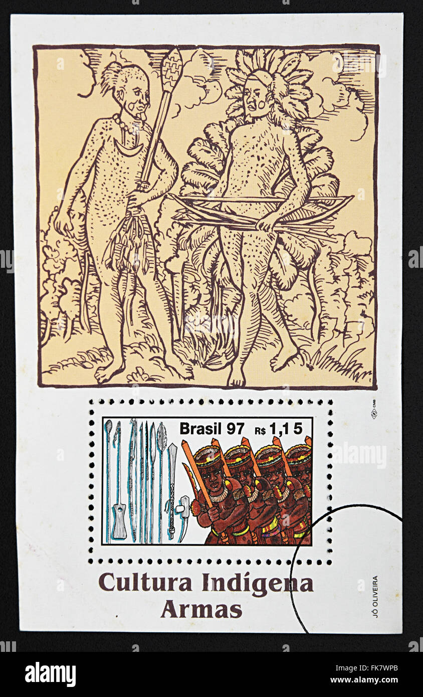 A stamp printed in Brazil dedicated to indigenous culture, weapons, 1997 Stock Photo