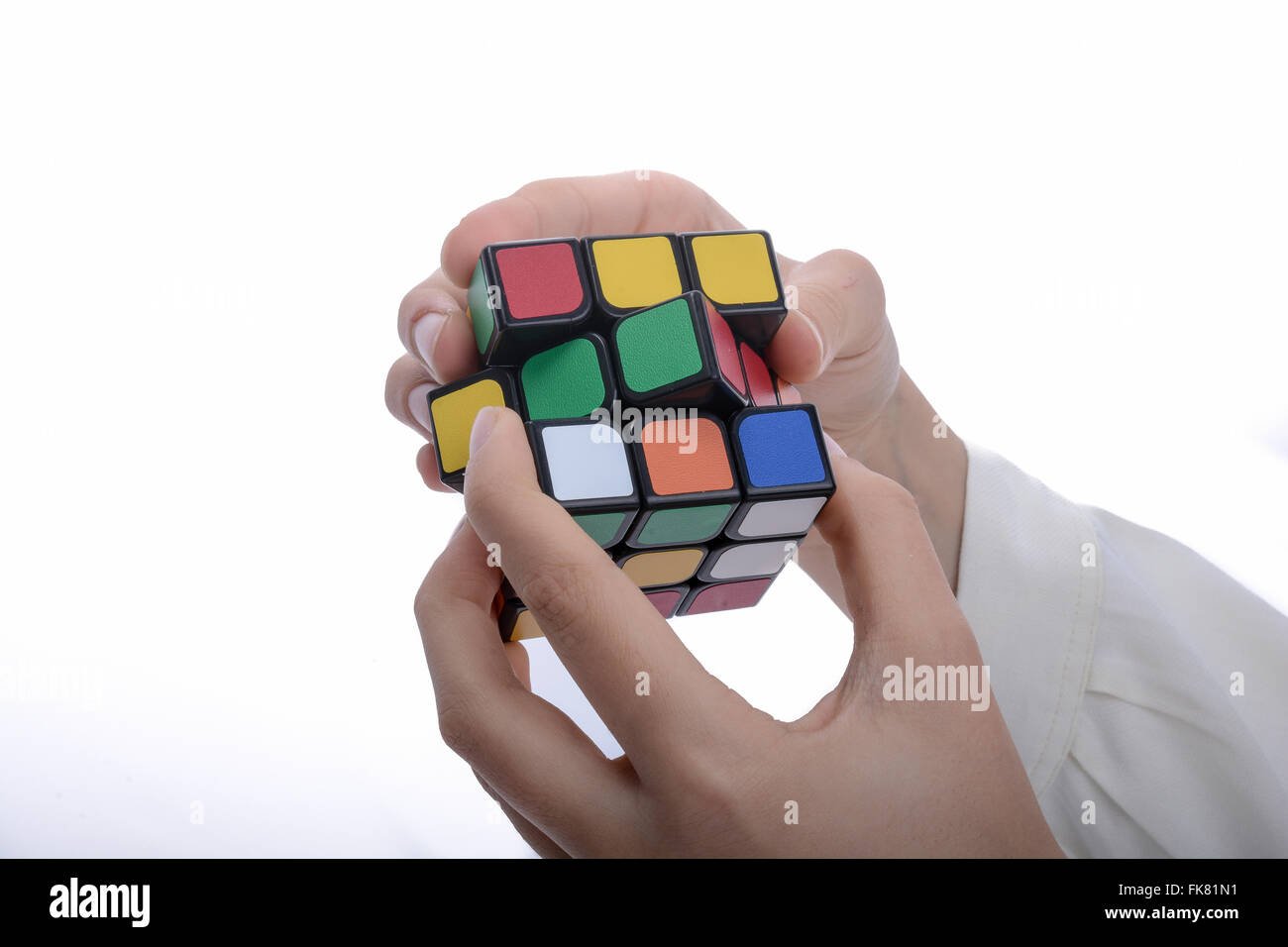 Rubik's cube and hand hi-res stock photography and images - Alamy
