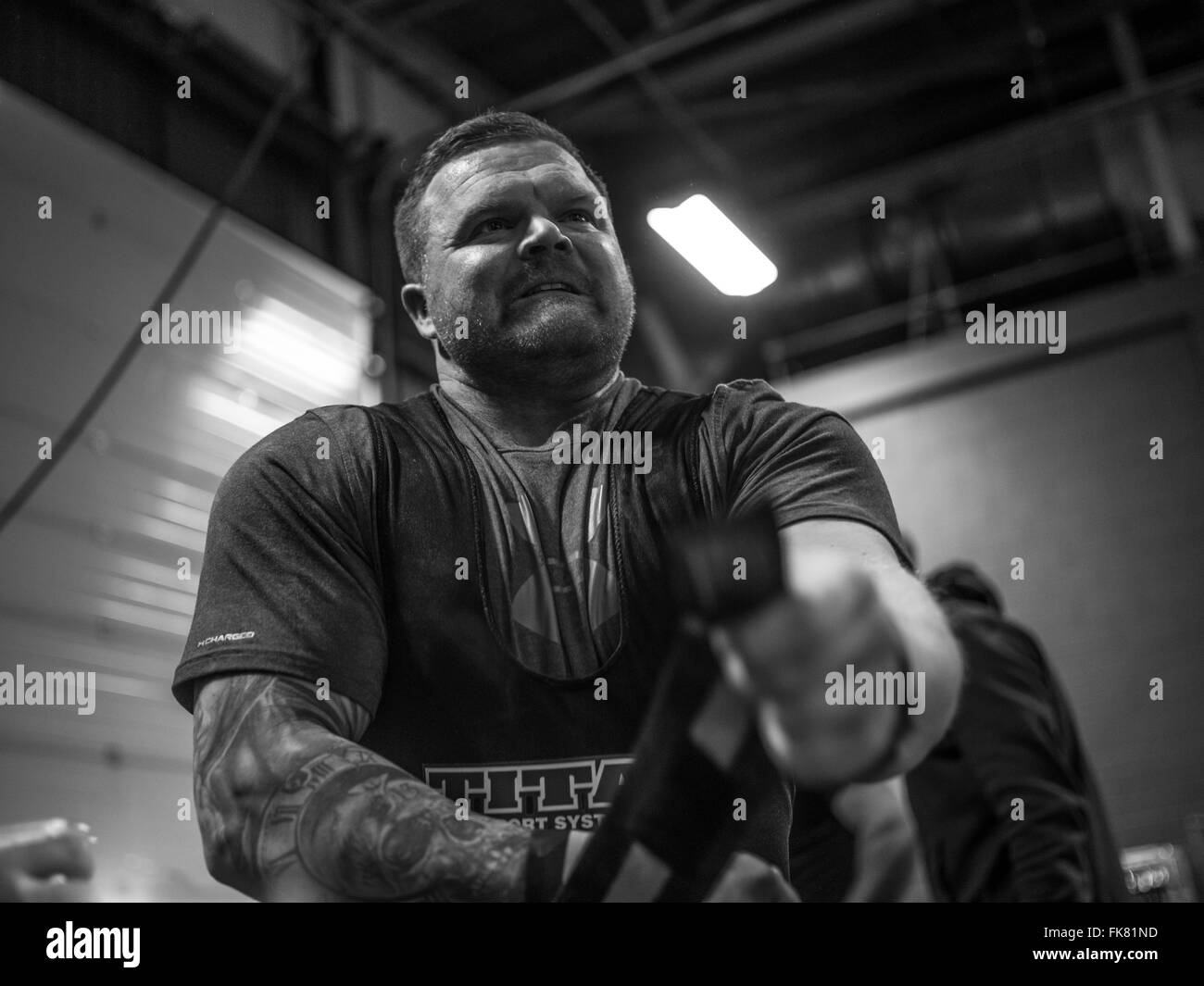 Documentary photography from a power lifting event featuring men