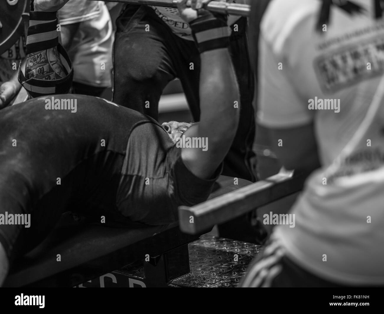 Documentary photography from a power lifting event featuring men