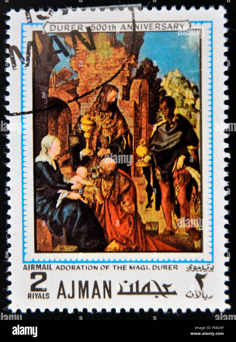 AJMAN - CIRCA 1970: a stamp printed in Ajman shows Adoration of the Magi, Painting by Albrecht Durer, circa 1970 Stock Photo