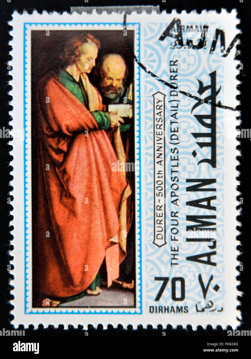 AJMAN - CIRCA 1970: a stamp printed in Ajman shows The Four Apostles, Detail, Painting by Albrecht Durer, circa 1970 Stock Photo