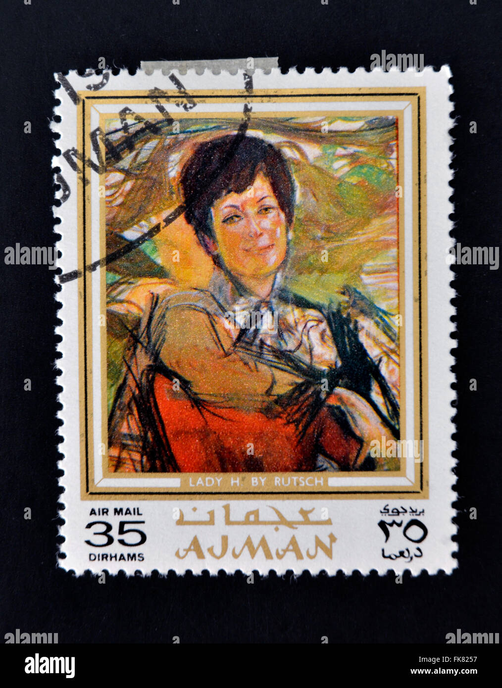AJMAN - CIRCA 1970 A stamp printed in Ajman shows Lady portrait by Alexander Rutsch, circa 1970 Stock Photo
