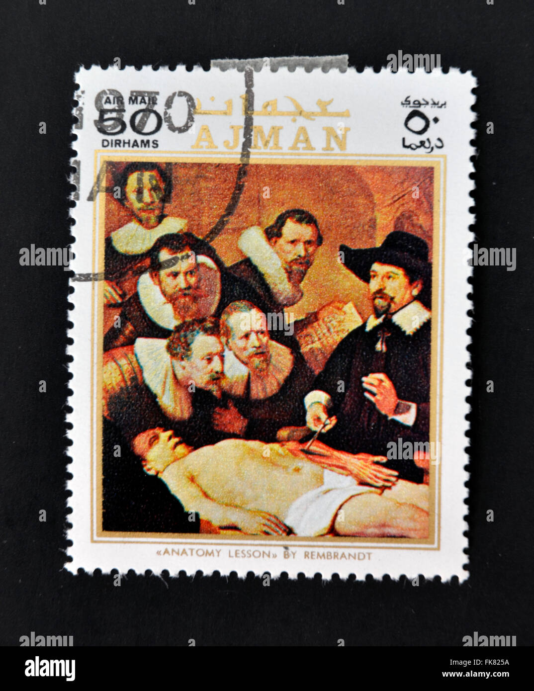 AJMAN - CIRCA 1970: A stamp printed in Ajman shows Anatomy lesson by Rembrandt, circa 1970 Stock Photo