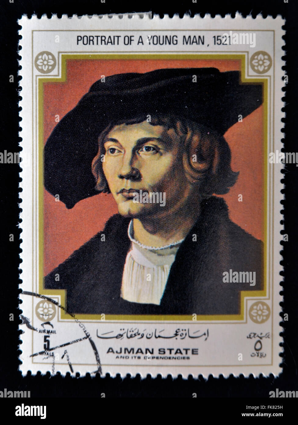 AJMAN - CIRCA 1970: A stamp printed in Ajman shows Portrait of Young Man, by Albrecht Durer (1471-1528), circa 1970 Stock Photo