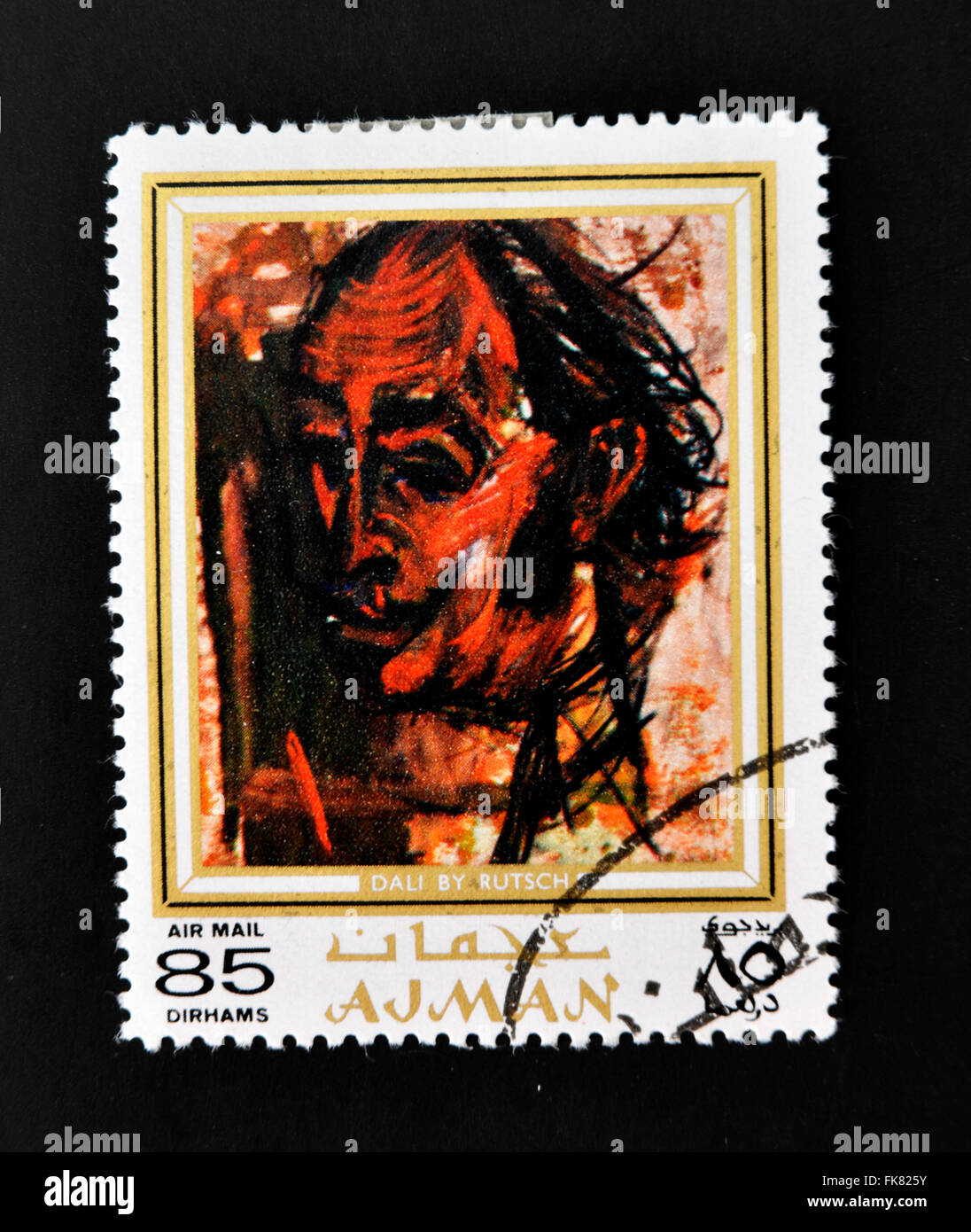AJMAN - CIRCA 1970 A stamp printed in Ajman shows Dali portrait by Alexander Rutsch, circa 1970 Stock Photo