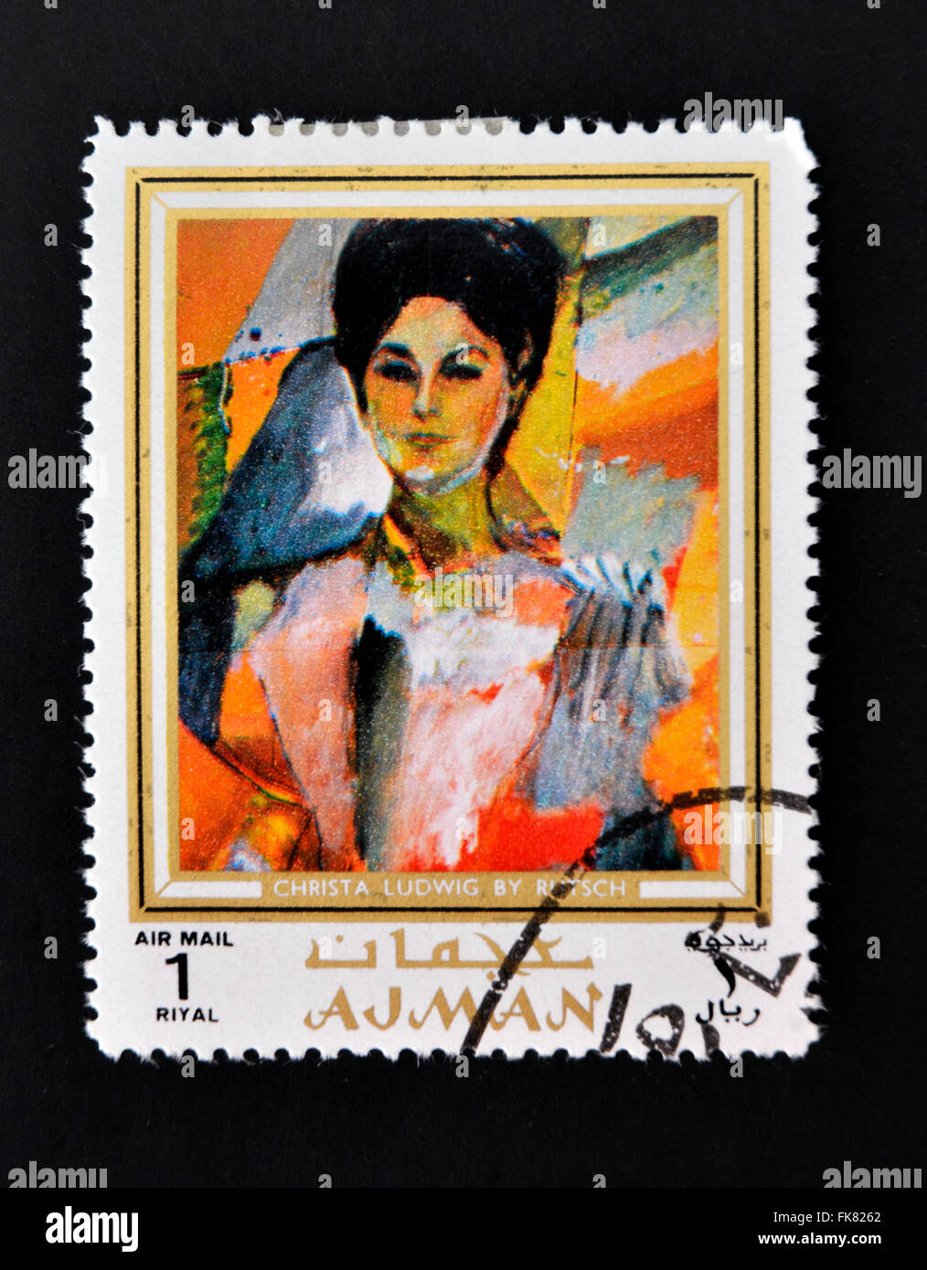AJMAN - CIRCA 1970 A stamp printed in Ajman shows Christa Ludwig portrait by Alexander Rutsch, circa 1970 Stock Photo