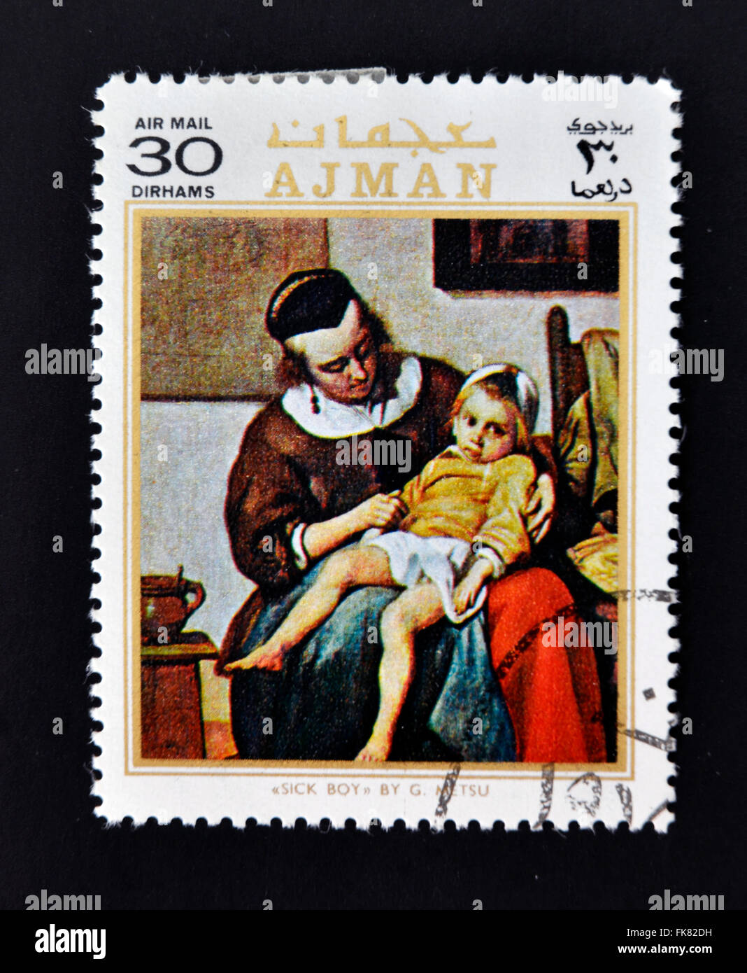 AJMAN - CIRCA 1970: A stamp printed in Ajman shows sick boy by Metsu, circa 1970 Stock Photo