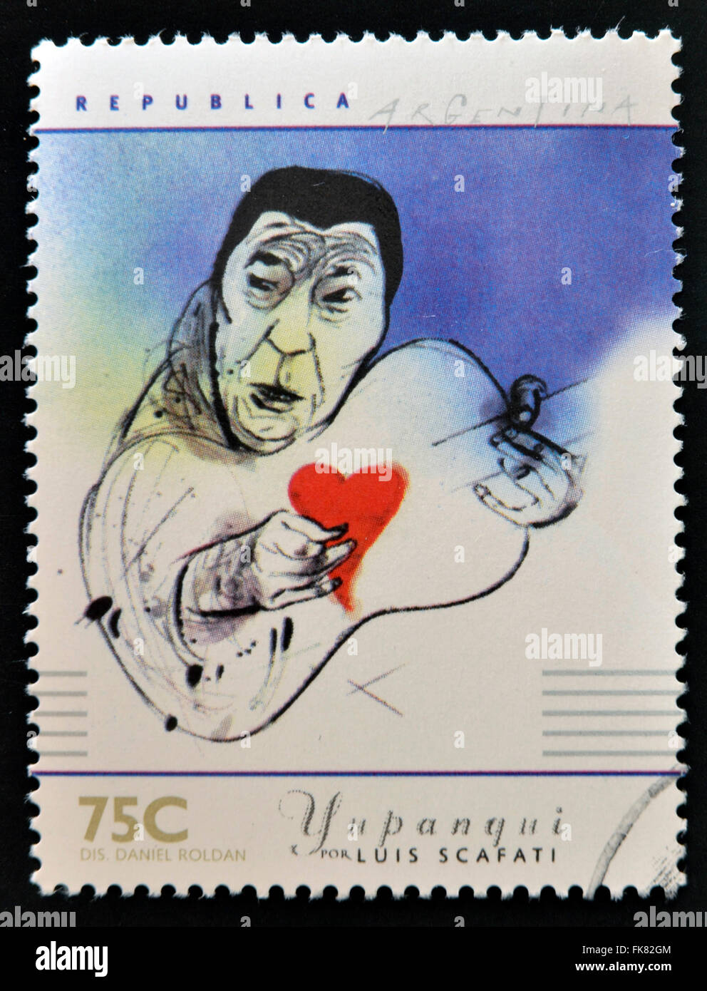 ARGENTINA - CIRCA 1997: A stamp printed in Argentina dedicated to argentinian musicians, shows Atahualpa Yupanqui by Luis Scafat Stock Photo