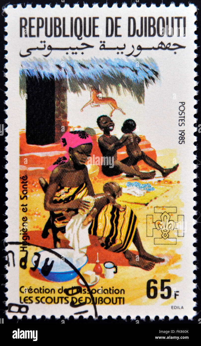 DJIBOUTI - CIRCA 1985: A stamp printed in Djibouti dedicated to the hygiene and children, circa 1985 Stock Photo