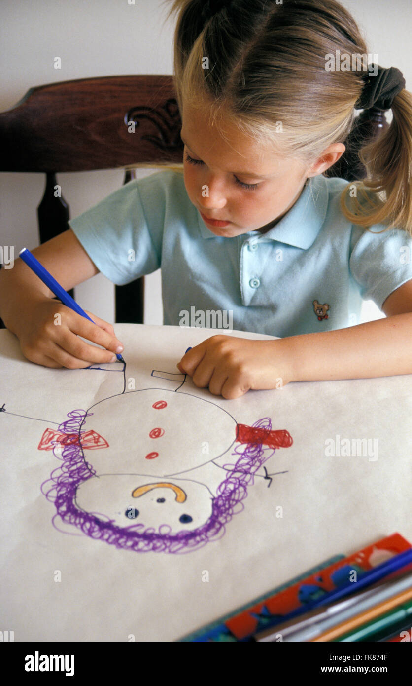 child drawing and colouring Stock Photo