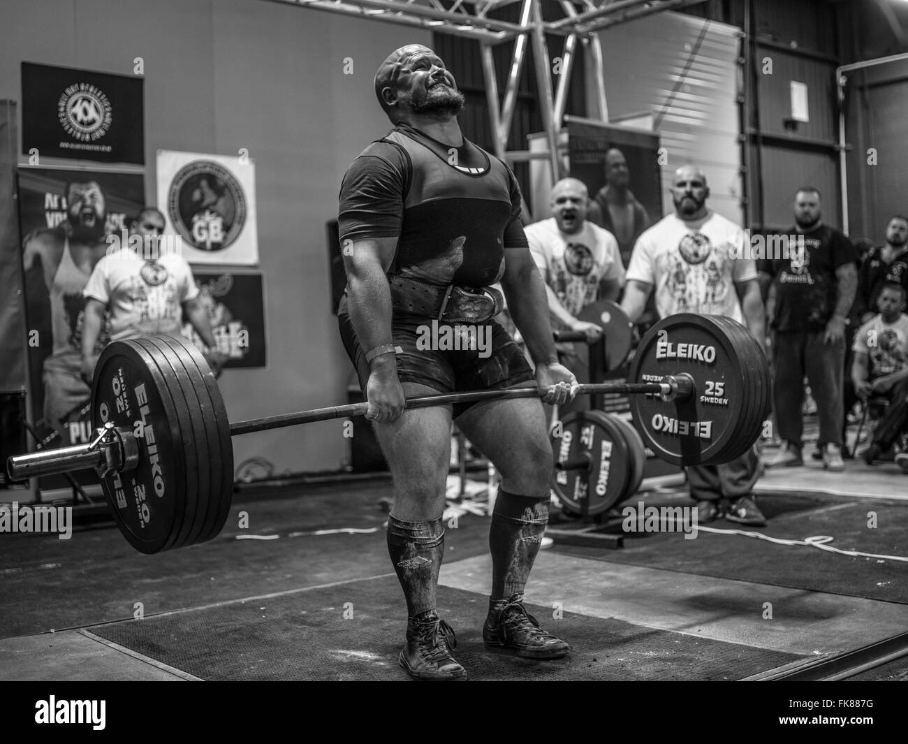 Documentary photography from a power lifting event featuring men