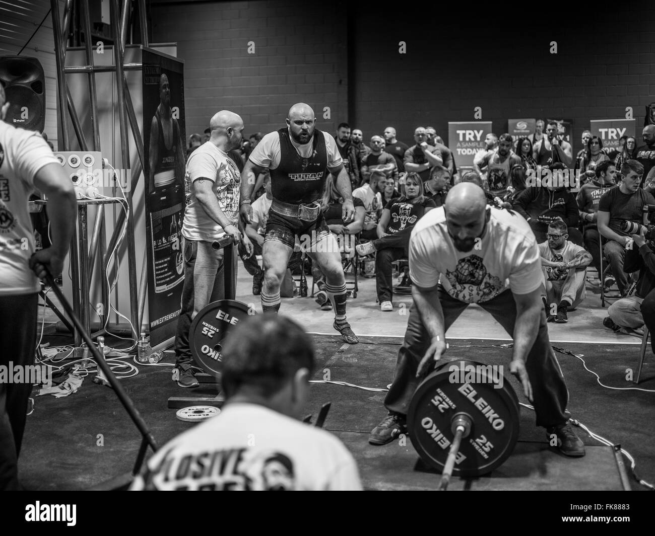 Documentary photography from a power lifting event featuring men