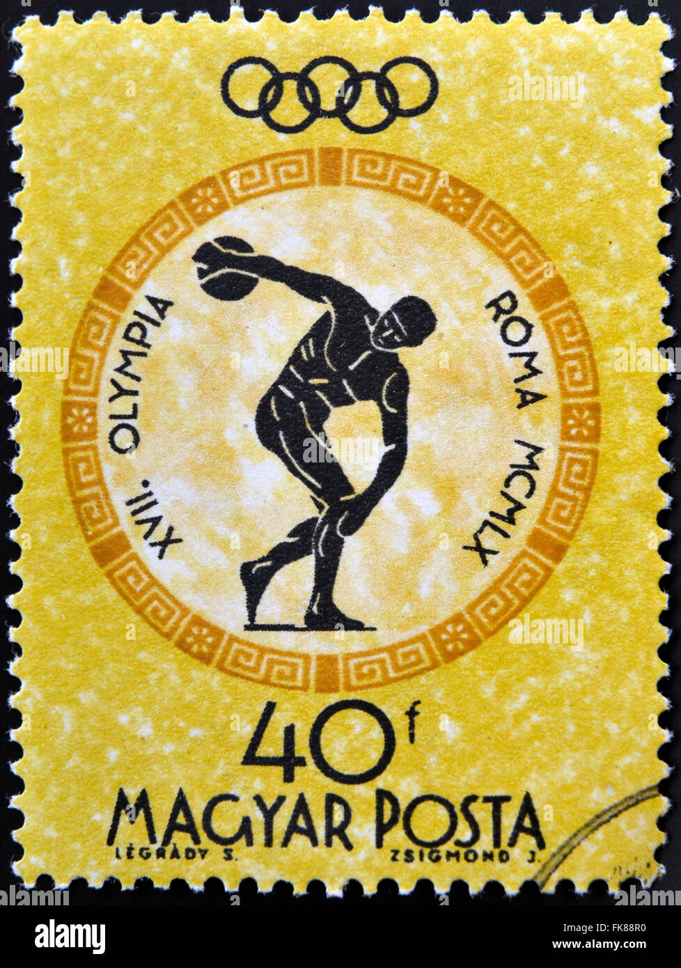HUNGARY - CIRCA 1960: A stamp printed in Hungary shows discobolus, devoted to the Olympic games in Rome, circa 1960 Stock Photo