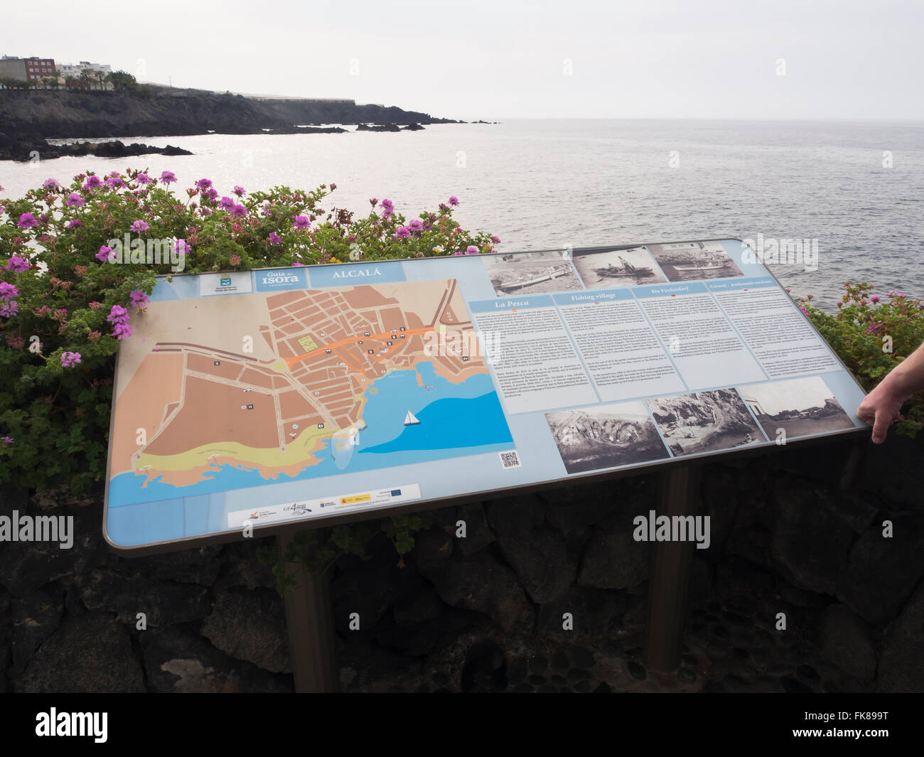 Information board and town map along the coastal promenade in Alcala Tenerife Spain, Stock Photo