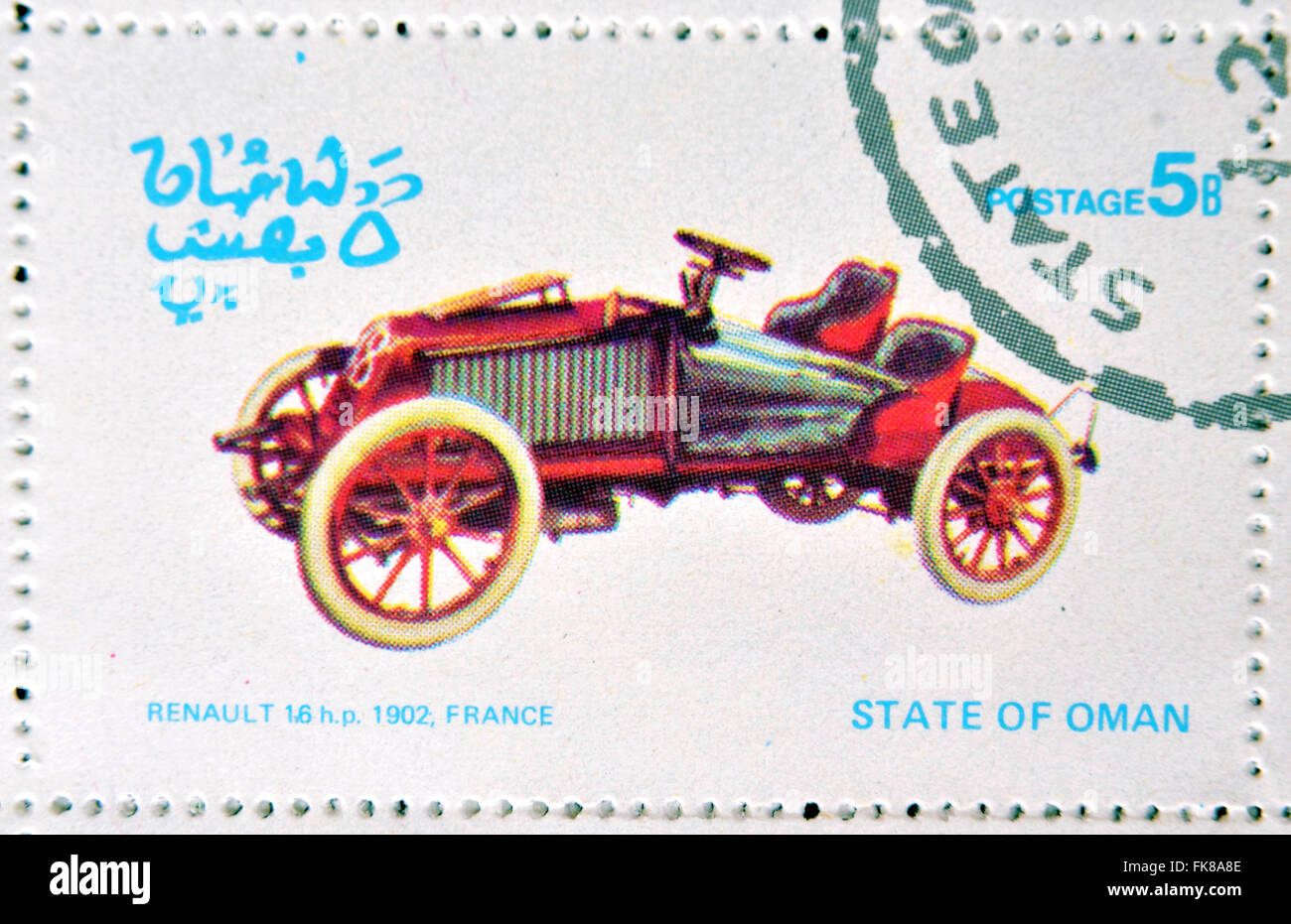 OMAN - CIRCA 1977: A stamp printed in State of Oman shows a old car, Renault 16 hp 1902, France, circa 1977 Stock Photo