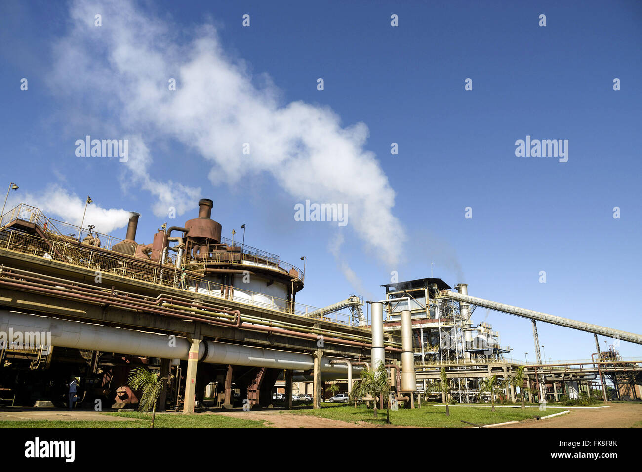 Smoke released by the fireplace for processing of sugarcane in plant Stock Photo