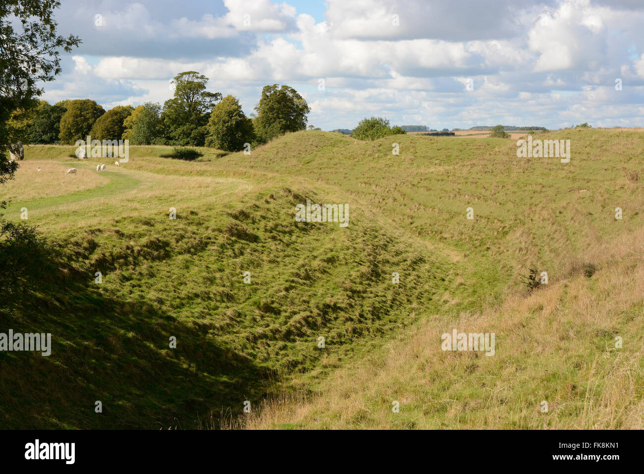 Neolithic stone circle and earth banks at Avebury in Wiltshire, England ...