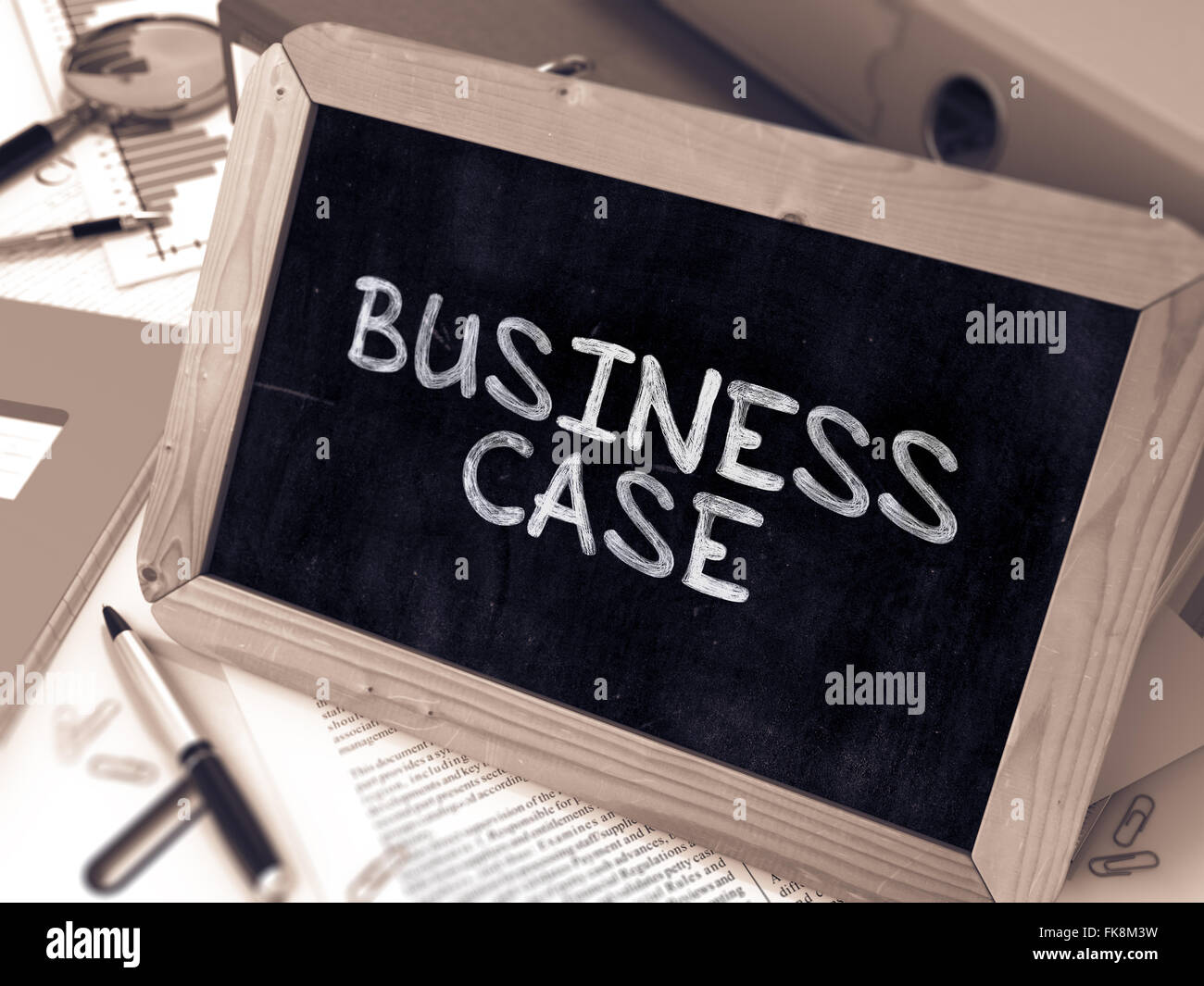 Business Case Handwritten by White Chalk on a Blackboard. Stock Photo
