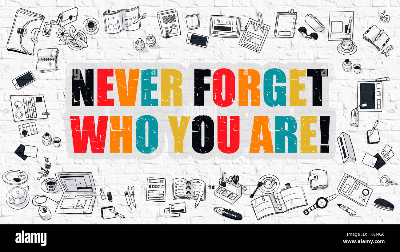 Never Forget Who You are Concept. Multicolor on White Brickwall. Stock Photo