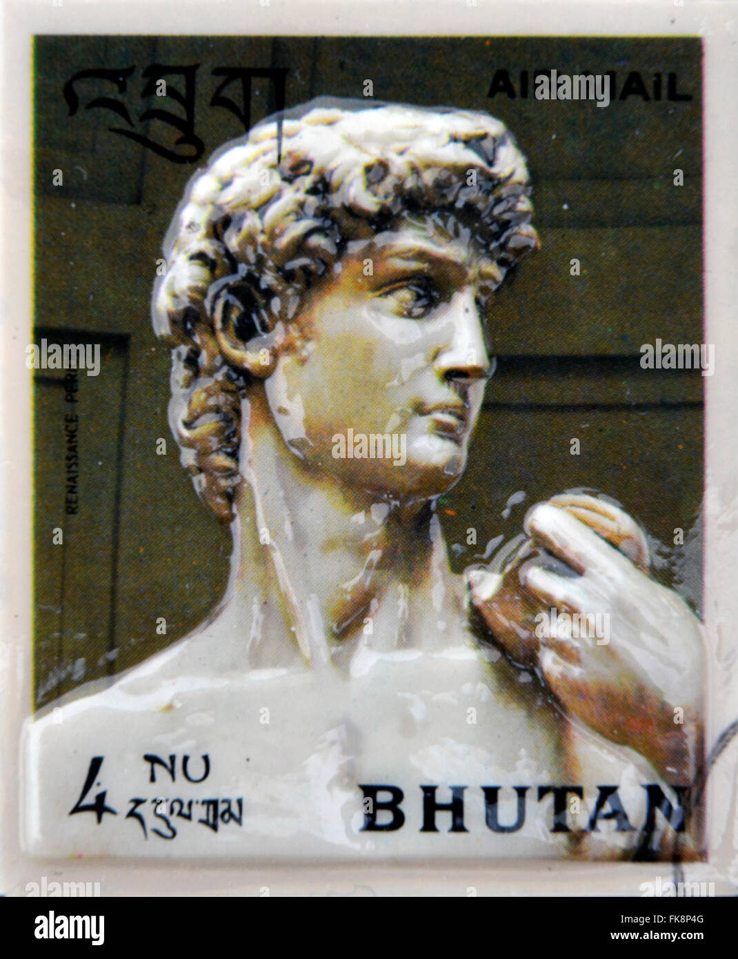 BHUTAN - CIRCA 1971: Stamp printed in Bhutan dedicated to History of Sculpture, shows David by Michelangelo, circa 1971 Stock Photo