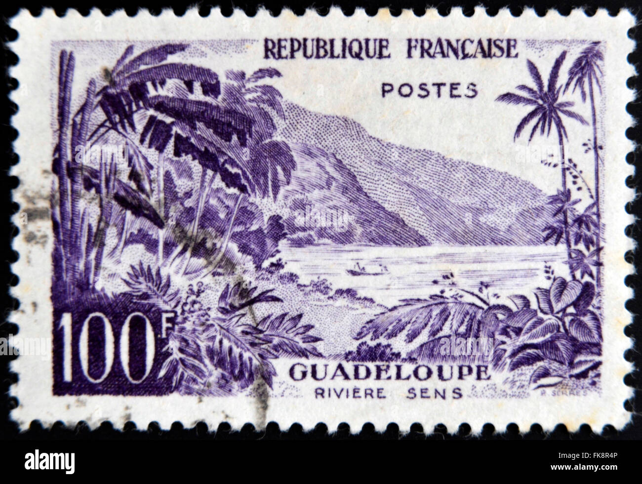 FRANCE - CIRCA 1957: stamp printed in France shows Guadeloupe, Sens river, circa 1957 Stock Photo