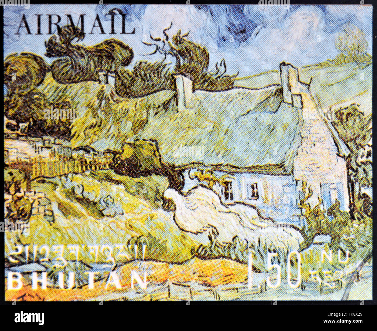 BHUTAN - CIRCA 1980: A stamp printed in Bhutan shows Grasgrond by Vincent Van Gogh, circa 1980 Stock Photo