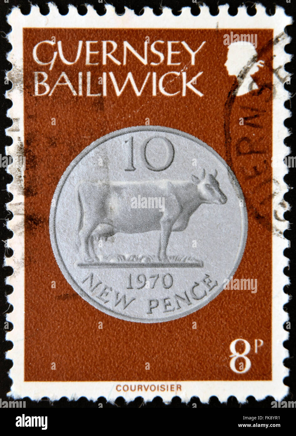 GUERNSEY - CIRCA 1979: A stamp printed in Guernsey shows Ten New Pence, 1970, circa 1979 Stock Photo