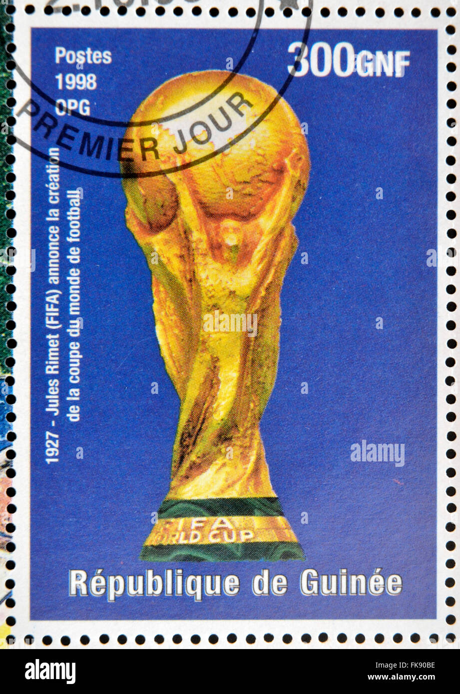 A stamp printed in Republic of Guinea commemorating Jules Rimet (FIFA) announced the creation of the football world cup Stock Photo