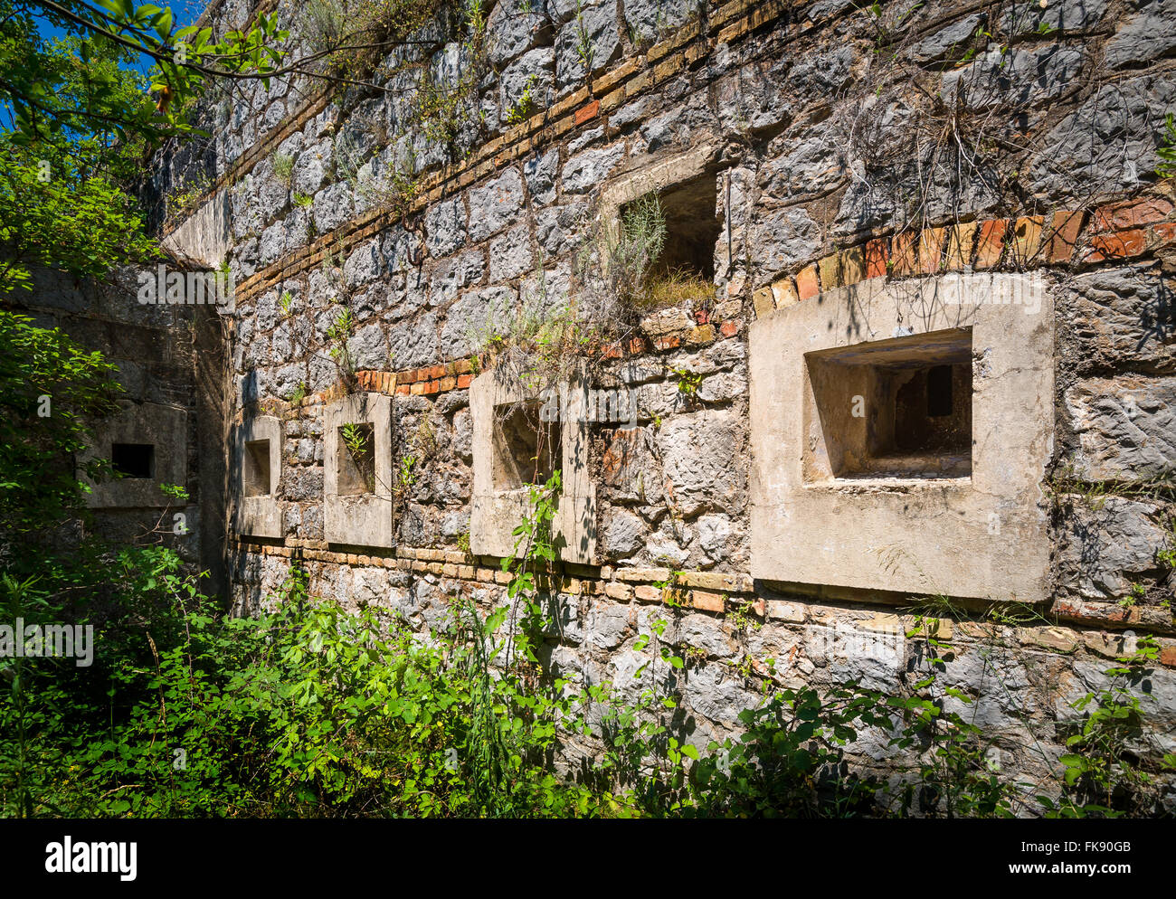 Ancient fortification wall with windows Stock Photo