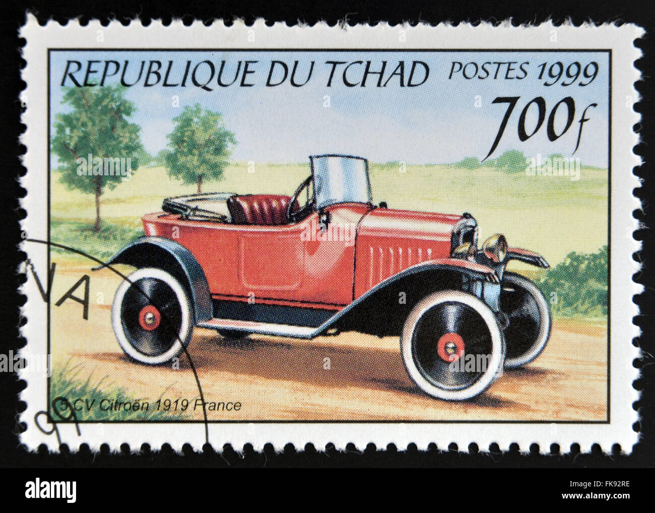 CHAD - CIRCA 1999: A stamp printed in Chad shows retro car Citroen 1919, France, circa 1999 Stock Photo