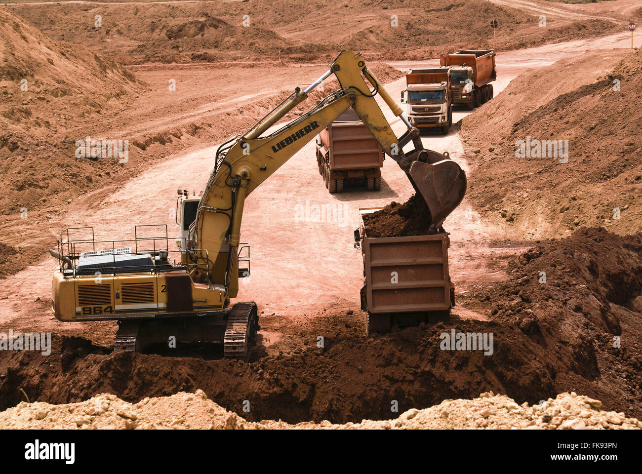 Loading dump trucks with bauxite MRN MRN Stock Photo Alamy
