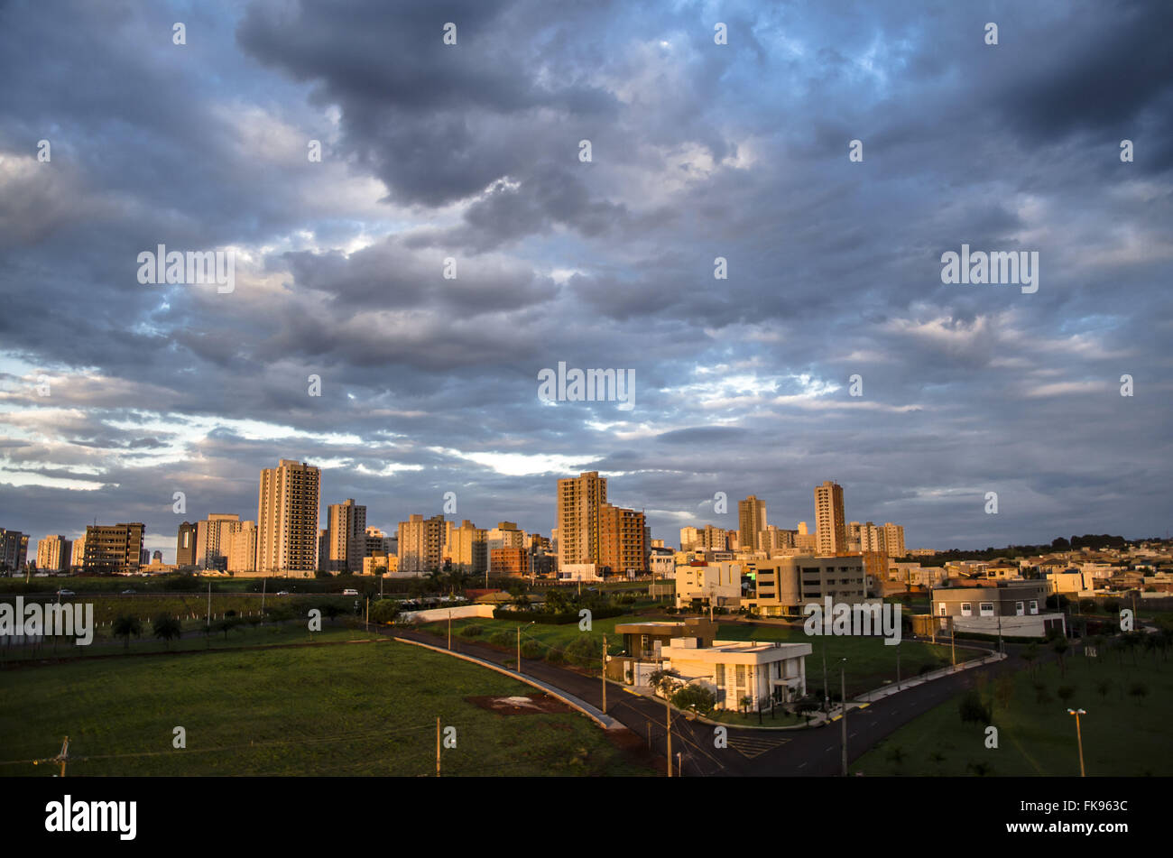 Temporal rainfall over buildings of the city in the afternoon Stock Photo