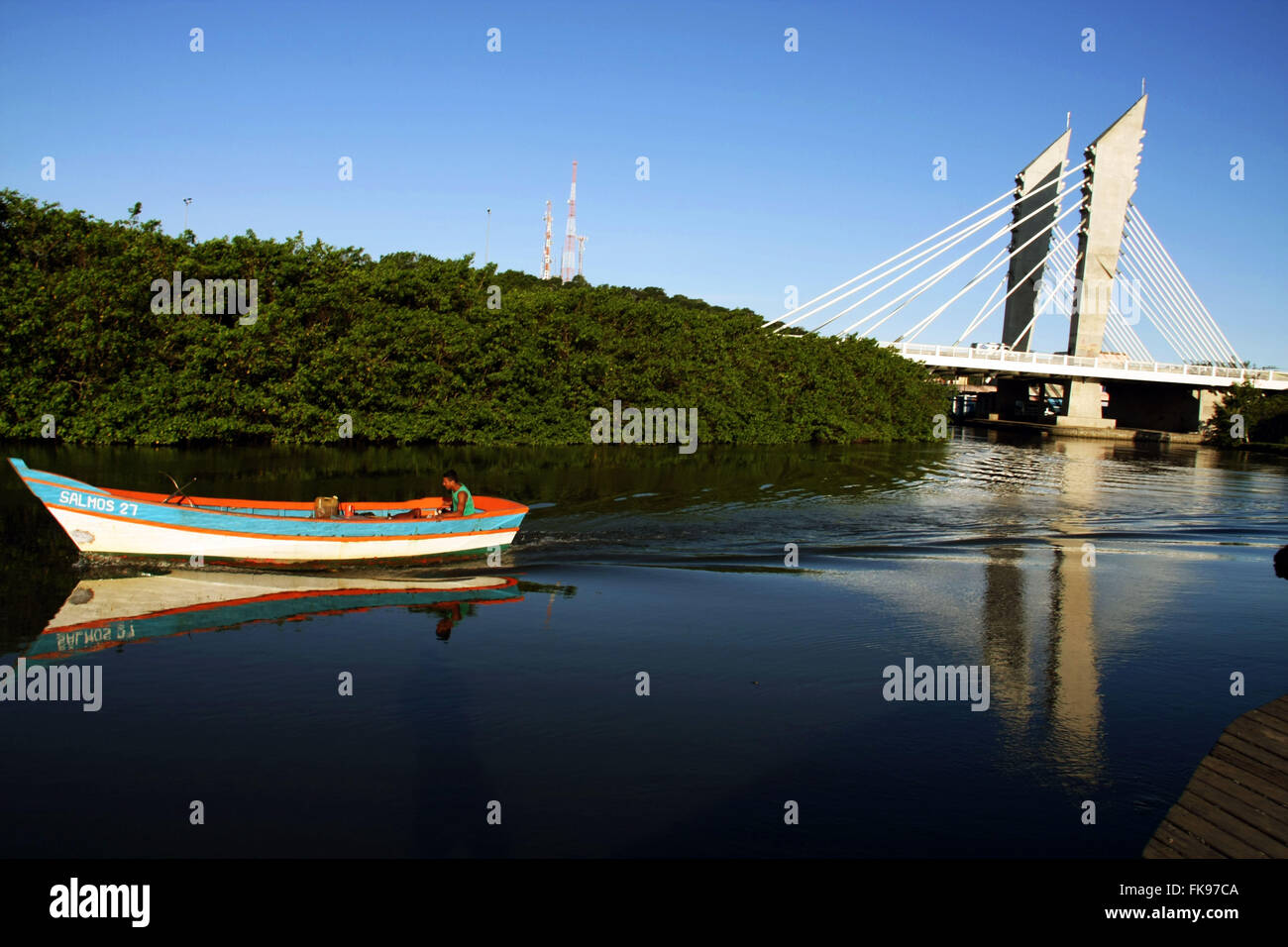 Fishing boat and cable-stayed bridge of Rio Oysters Stock Photo