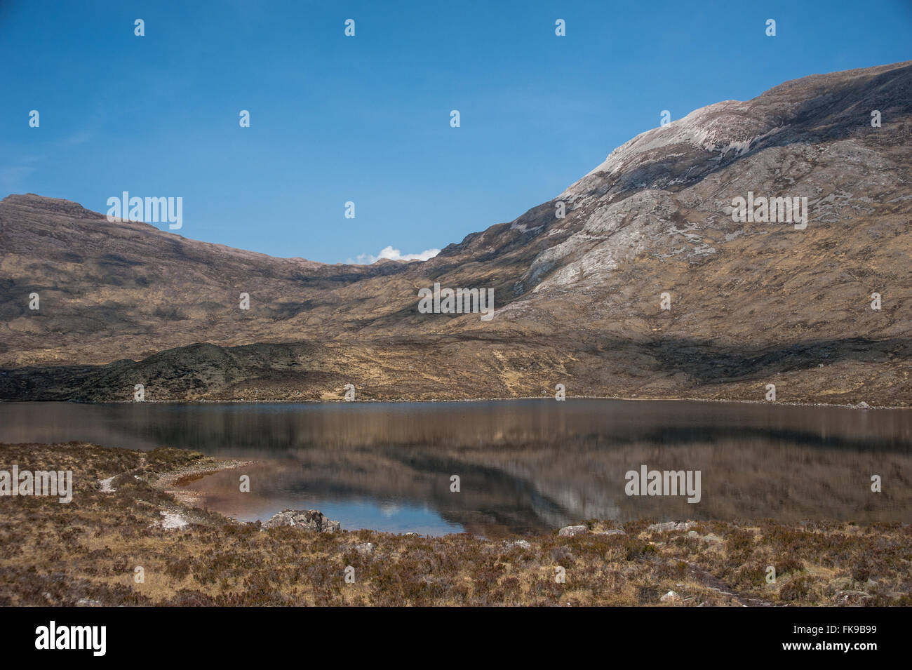 Loch Coire Fionnaraich and the slope of Sgorr Ruadh Stock Photo