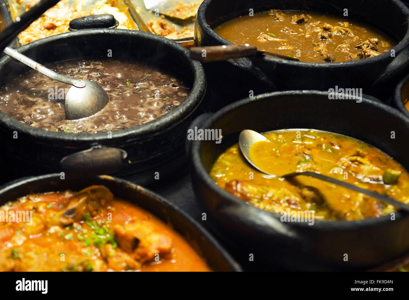 Wood stove with typical local food. Stock Photo