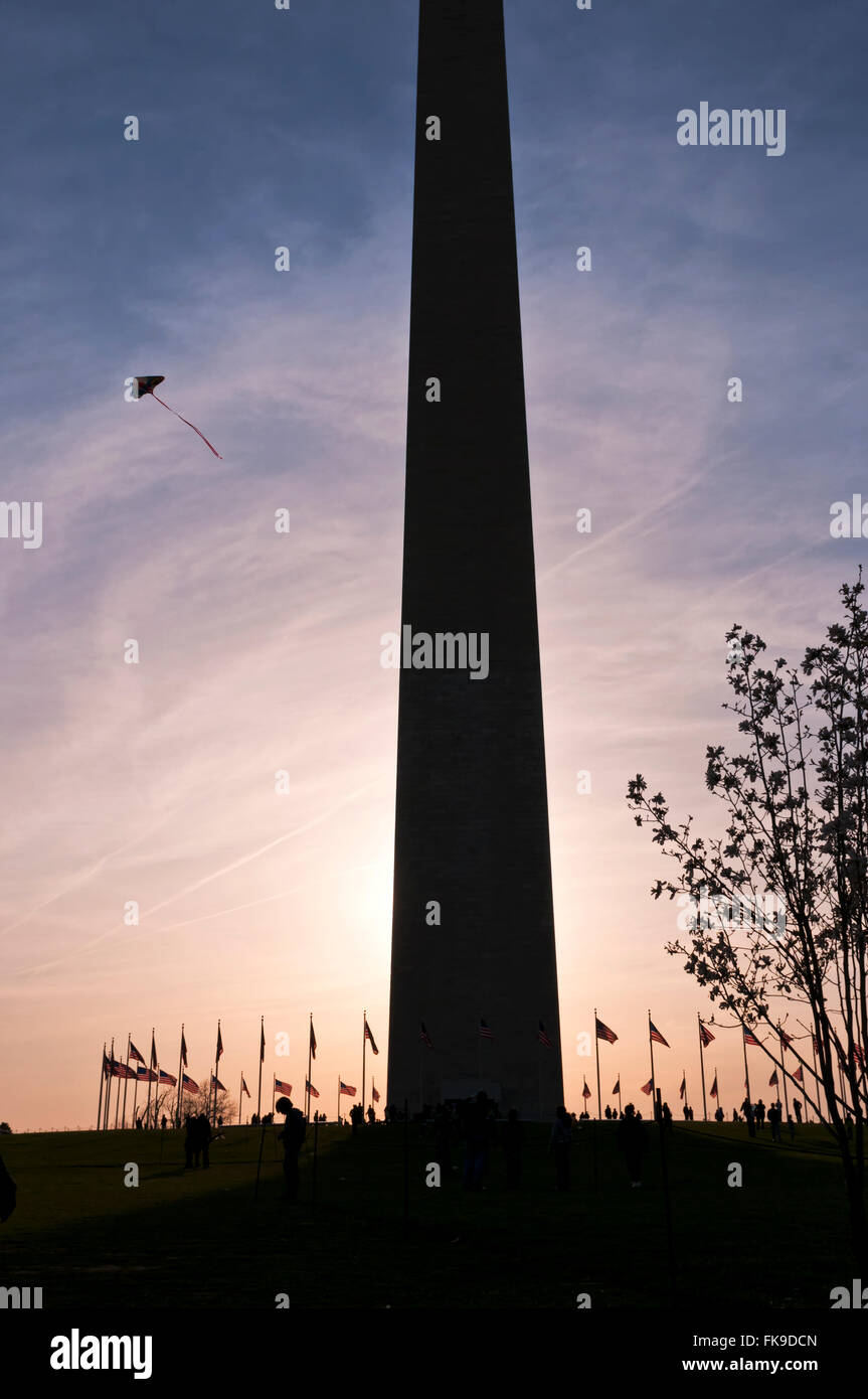 Washington Monument silhouette at sunset during the National Kite Festival. Stock Photo
