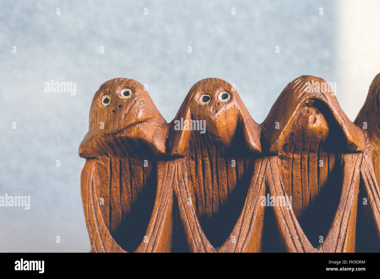 Three monkeys hear, see and speak no evil Stock Photo