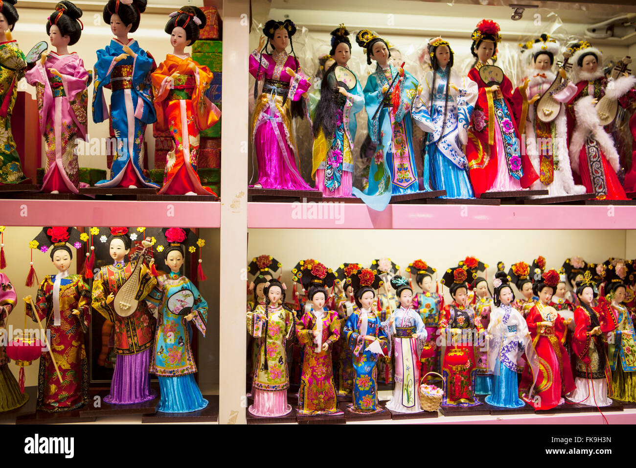 traditionally dressed dolls in shop in the Yuyuan Tourist Mart, Shanghai, China Stock Photo