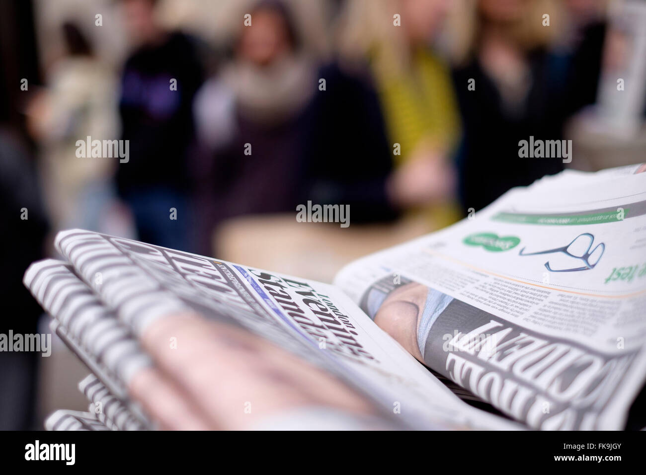 Evening Standard free newspaper available to be picked up at the entrance to Oxford Circus tube station, London Stock Photo