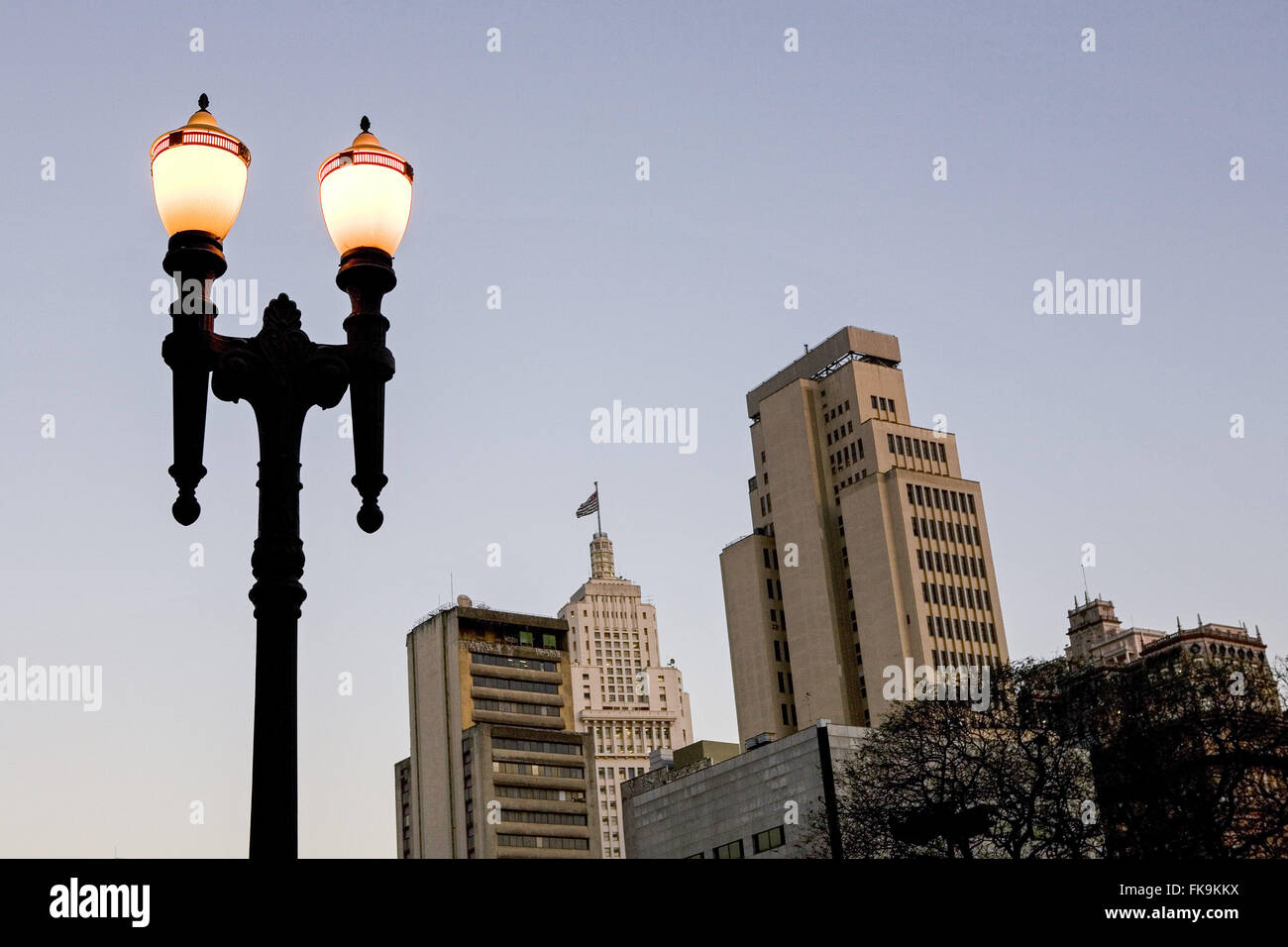 Antique lamp post with Edificio Altino Arantes - Banespa 1947 Incidental Stock Photo