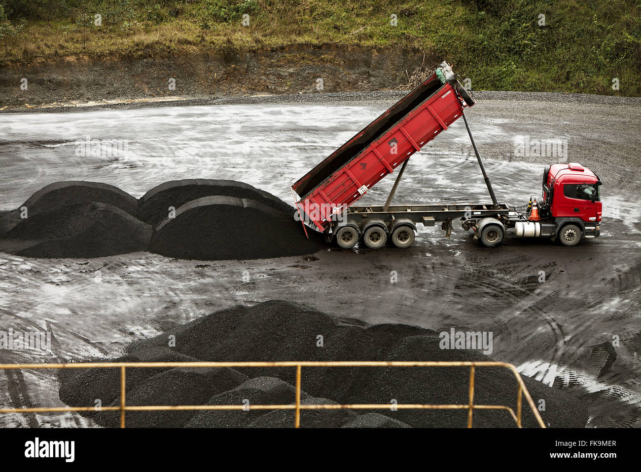 Dump truck unloading coal on the patio City of Criciuma Stock Photo Alamy