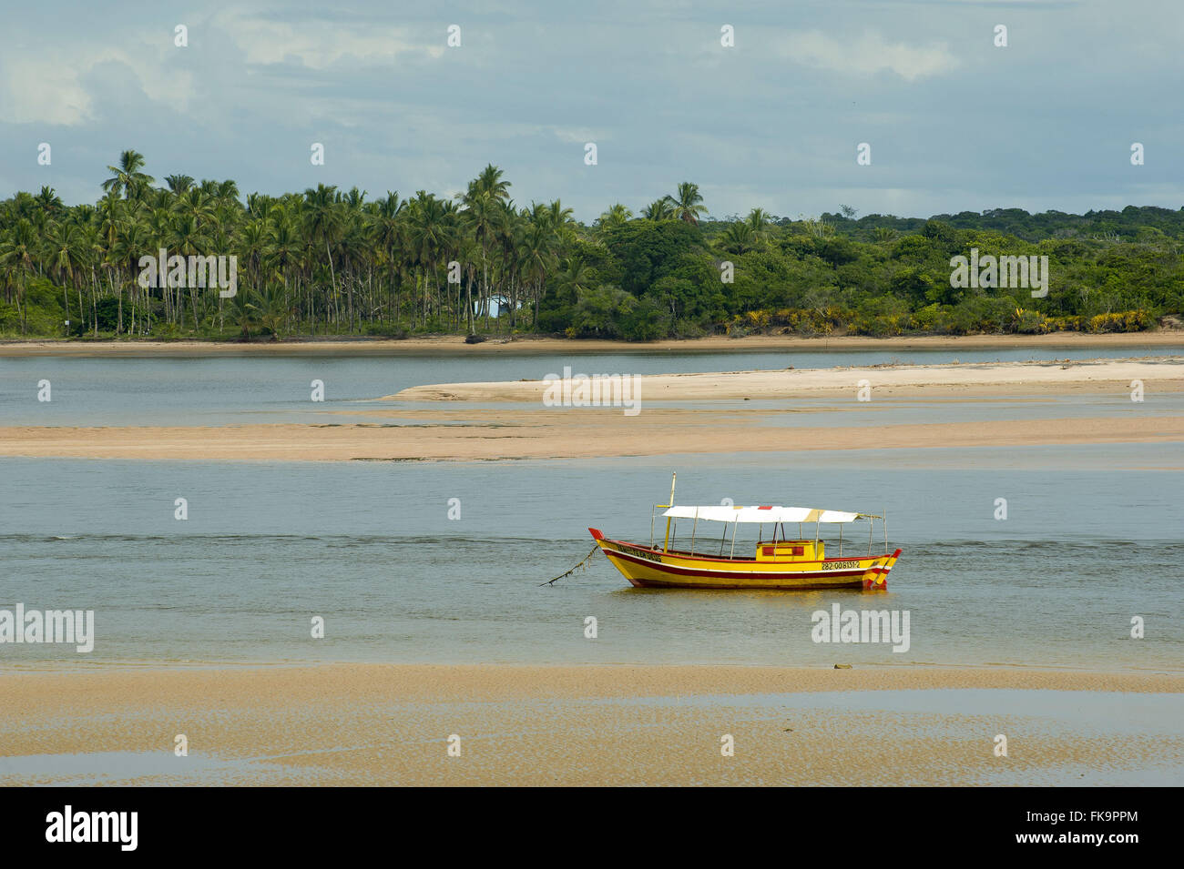 Fishing boat moored in Praia da Chaplet - Cocoa Coast Stock Photo