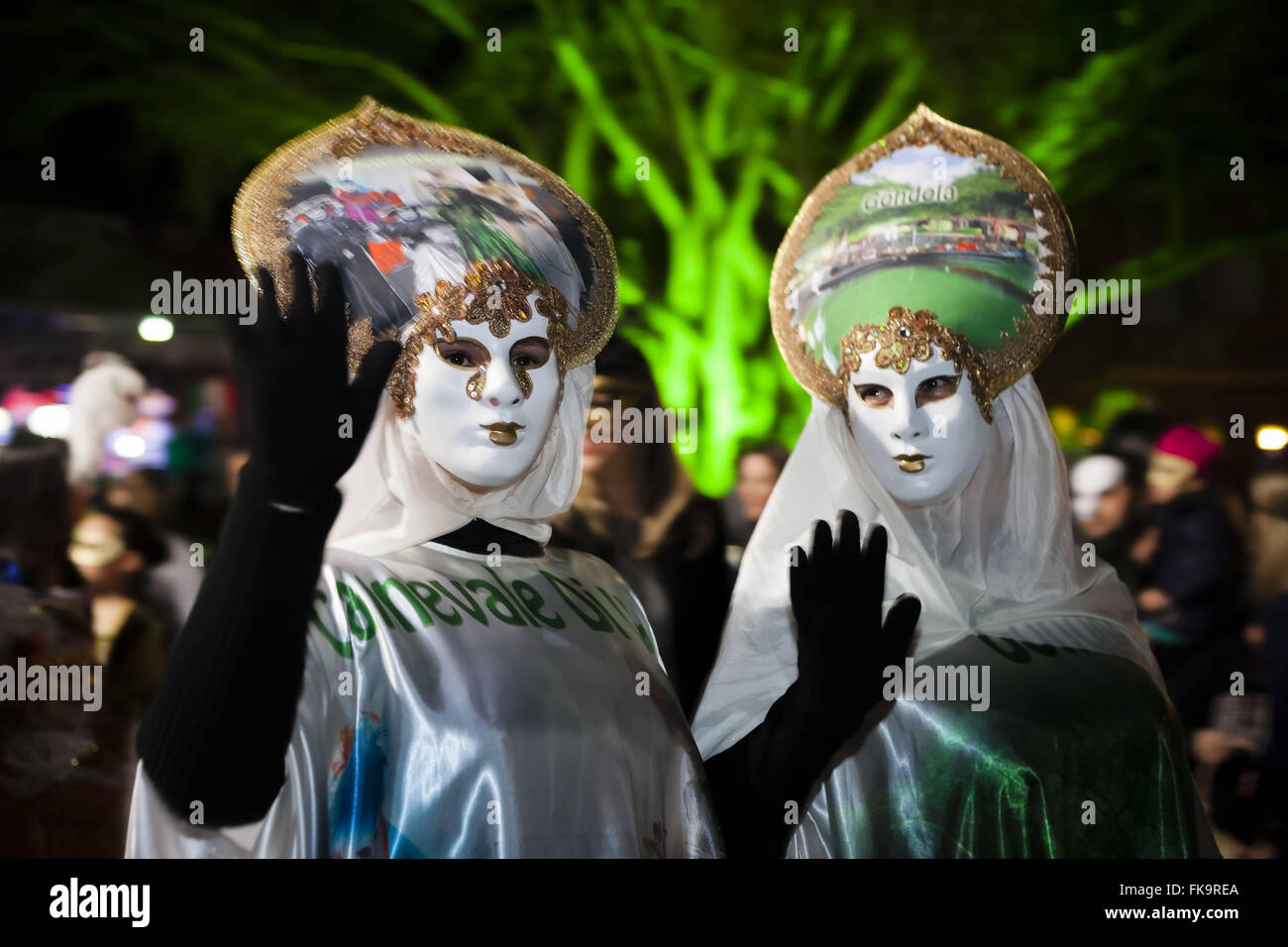 Masked revelers celebrating Carnevale di Venezia called Stock Photo
