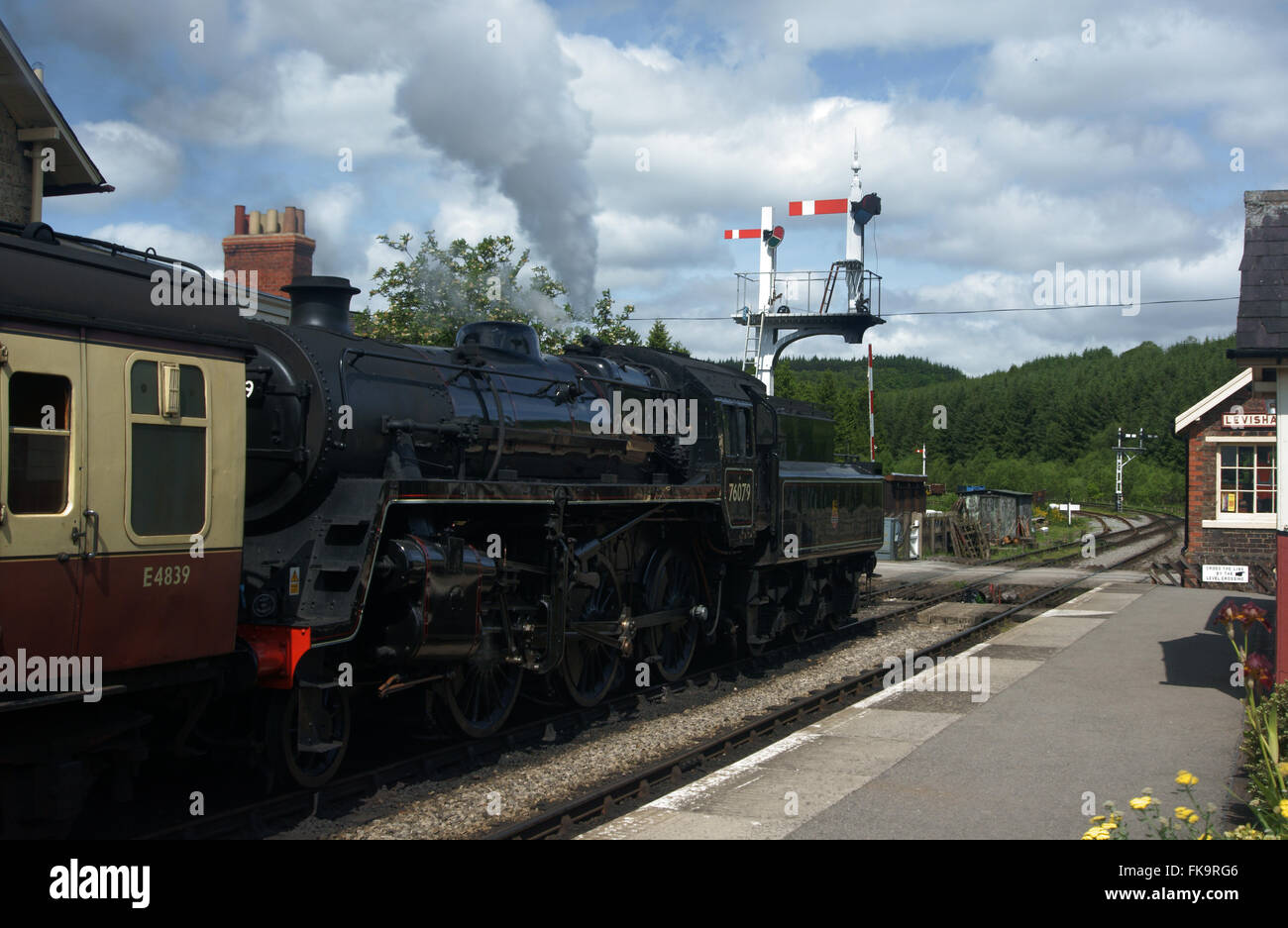 Steam locomotive 76079 waiting at Levisham station on the North York Moors Heritage Railway (NYMR) Stock Photo
