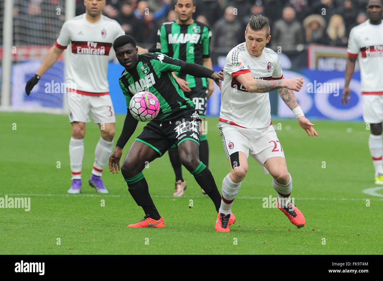 Reggio Emilia, Italy. 06th Mar, 2016. Joseph Alfred Duncan Sassuolo's midfielder and Juraj Kucka Milan's midfielder and national team of Slovacchia fight for the ball during the Serie A football match between US Sassuolo Calcio and AC Milan at Mapei Stadium in Reggio Emilia. US Sassuolo Calcio vs AC Milan Serie A football championship 2015/2016. US Sassuolo Calcio wins 2 - 0 over AC Milan. Joseph Alfred Duncan and Nicola Domenico Sansone are the scorers. Credit:  Massimo Morelli/Pacific Press/Alamy Live News Stock Photo