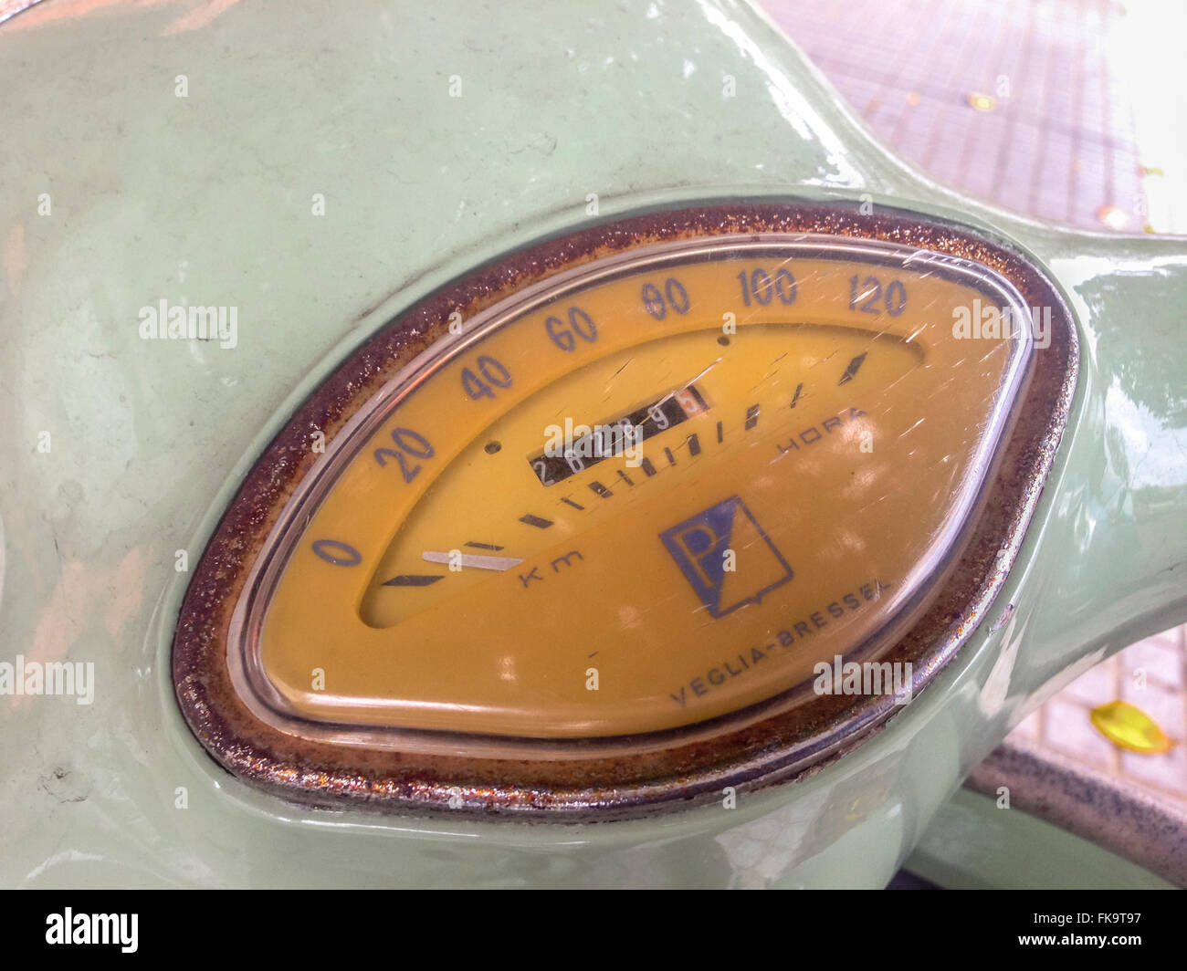 Cordoba, Spain - January 7, 2015: Green classical Italian Piaggio scooter rusty speedometer Stock Photo